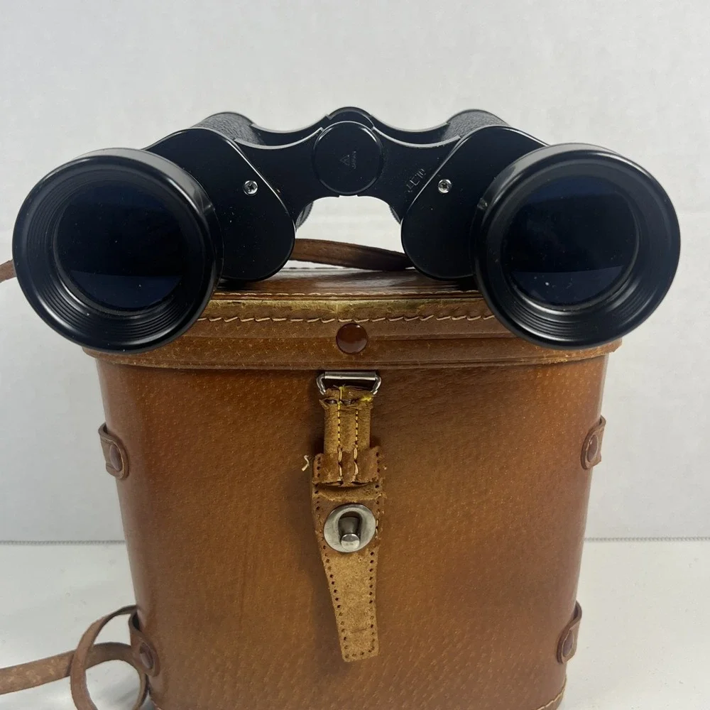 Vintage 50s-60s Tasco binoculars featuring 